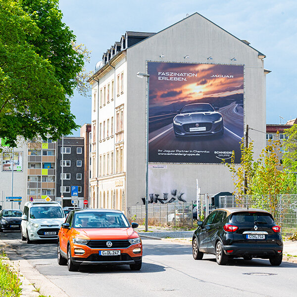 PWC Plakatversion Chemnitz - Riesenposter SCHNEIDER GRUPPE mit dem Motiv Jaguar - Außenwerbung Standort AUGUSTE