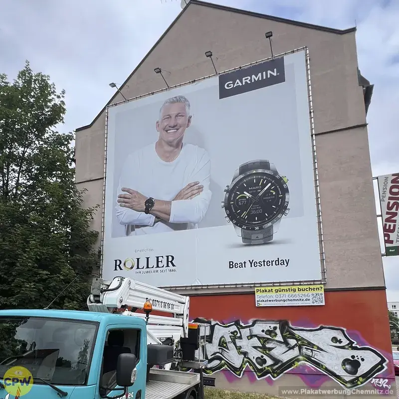 Juwelier Roller - GARMIN - Riesenposter am 64 qm großen Außenwerbestandort CLAUSI in Chemnitz